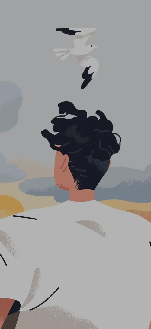 Person seen from behind under a gray sky